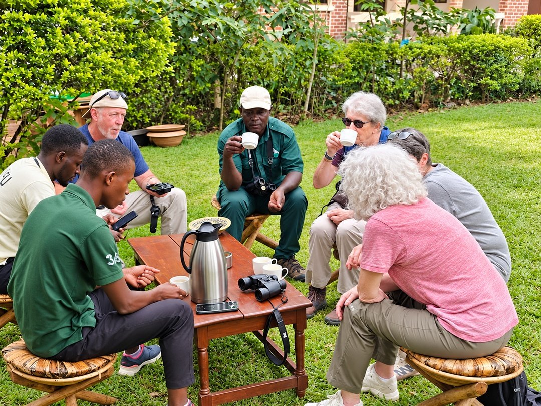 Tourists enjoying a coffee-drinking experience in Bigodi, Uganda