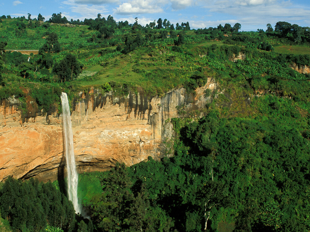 Tucked deep within Kibale National Park, Griffin Falls is one of the most peaceful and intimate highlights of Uganda Waterfall Experiences Beyond Murchison Falls.