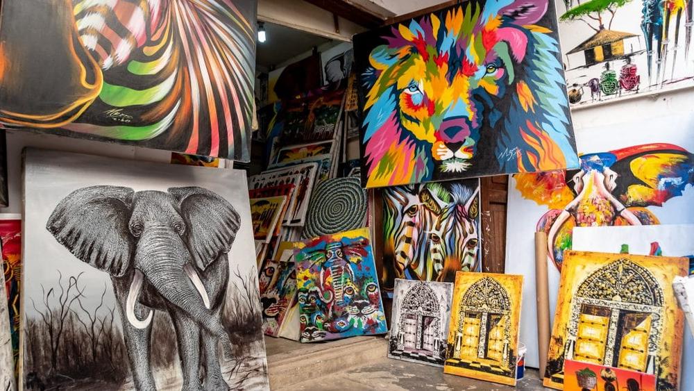 At the center of Zanzibar Beyond Beaches lies Stone Town, a place where history is not preserved behind glass but lived every day. The town’s maze-like streets are intentionally narrow, originally designed to provide shade and coolness in the tropical climate. As you walk through them, you notice the iconic carved wooden doors—each one telling a story through its patterns, symbols, and even the type of metal studs used. These doors once signified wealth, cultural background, and social status.