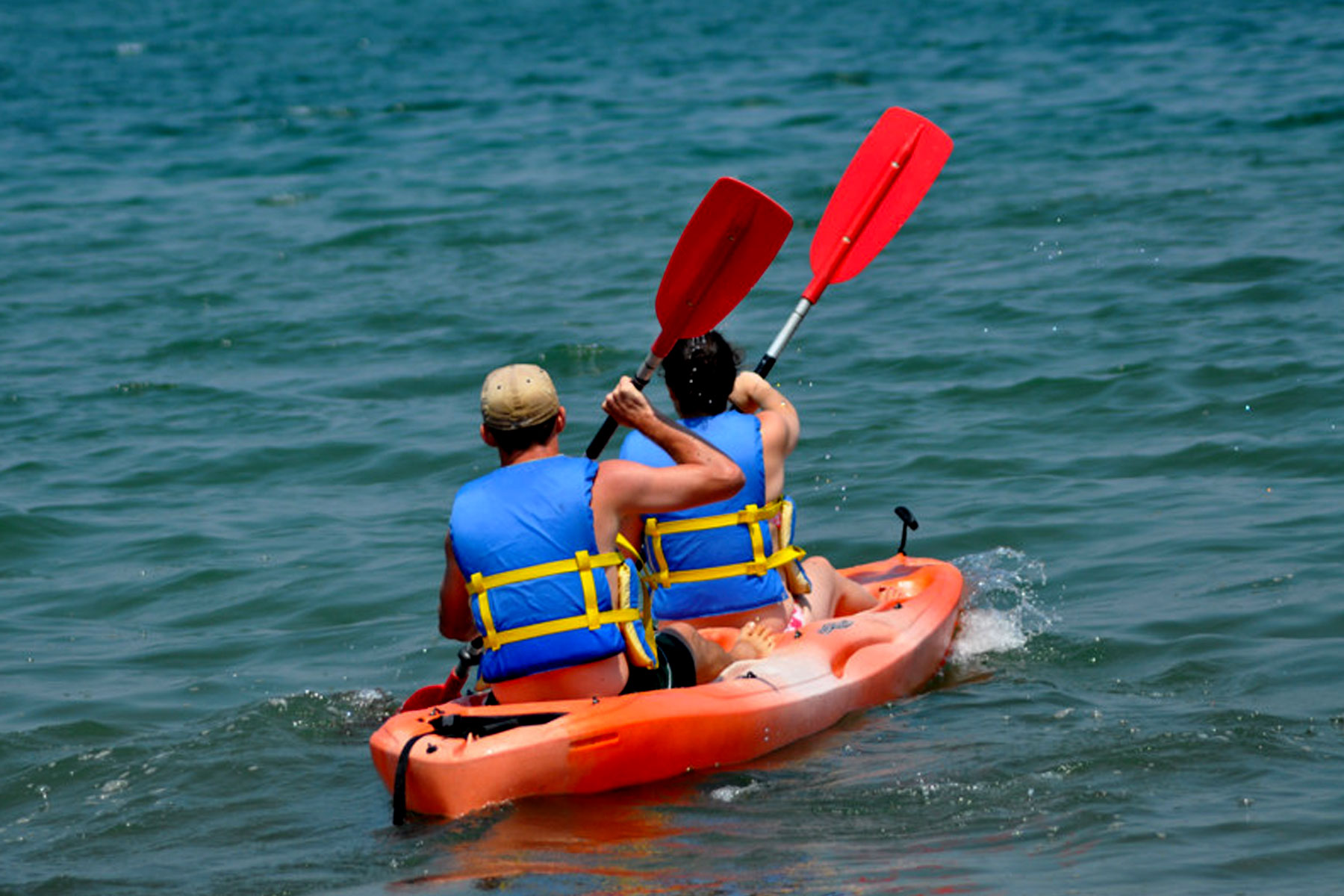 Travelers enjoying kayaking in Rwanda.