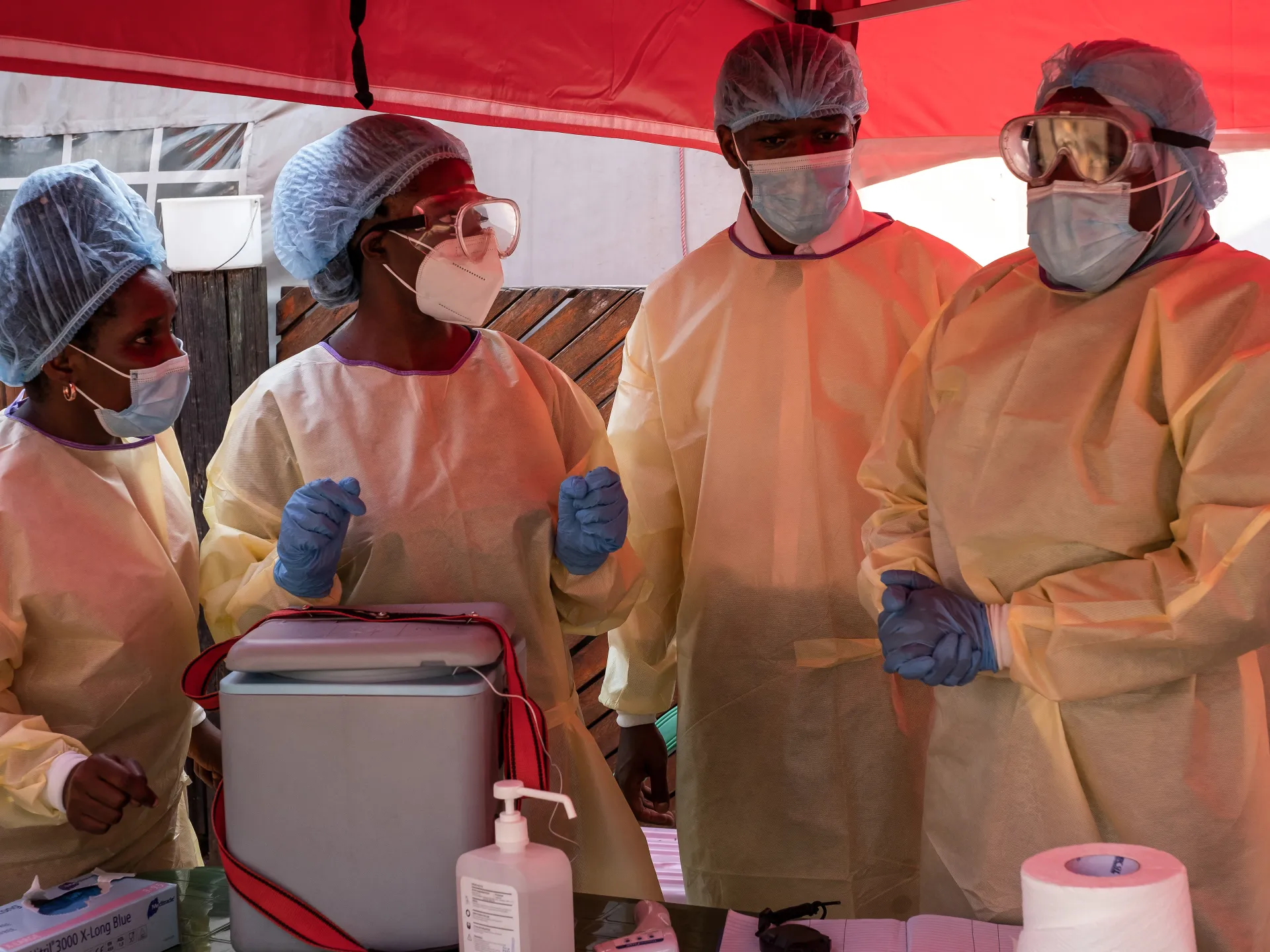 Health workers wearing personal protective equipment during ebola outbreak in Uganda.