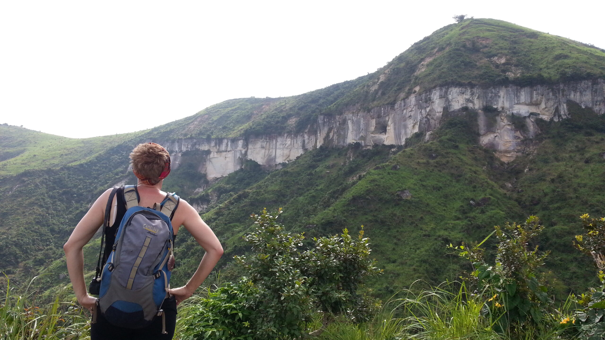 A tourist at Mount Mangengenge in Kinshasa that is one of the iconic features to visit in Congo.
