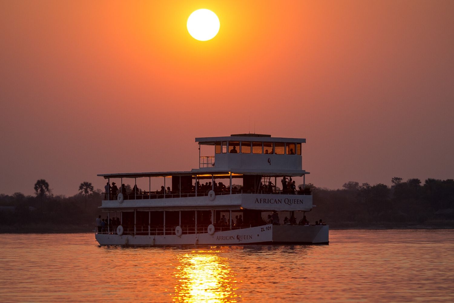 A sunset boat cruise on river Congo with best views of the river.