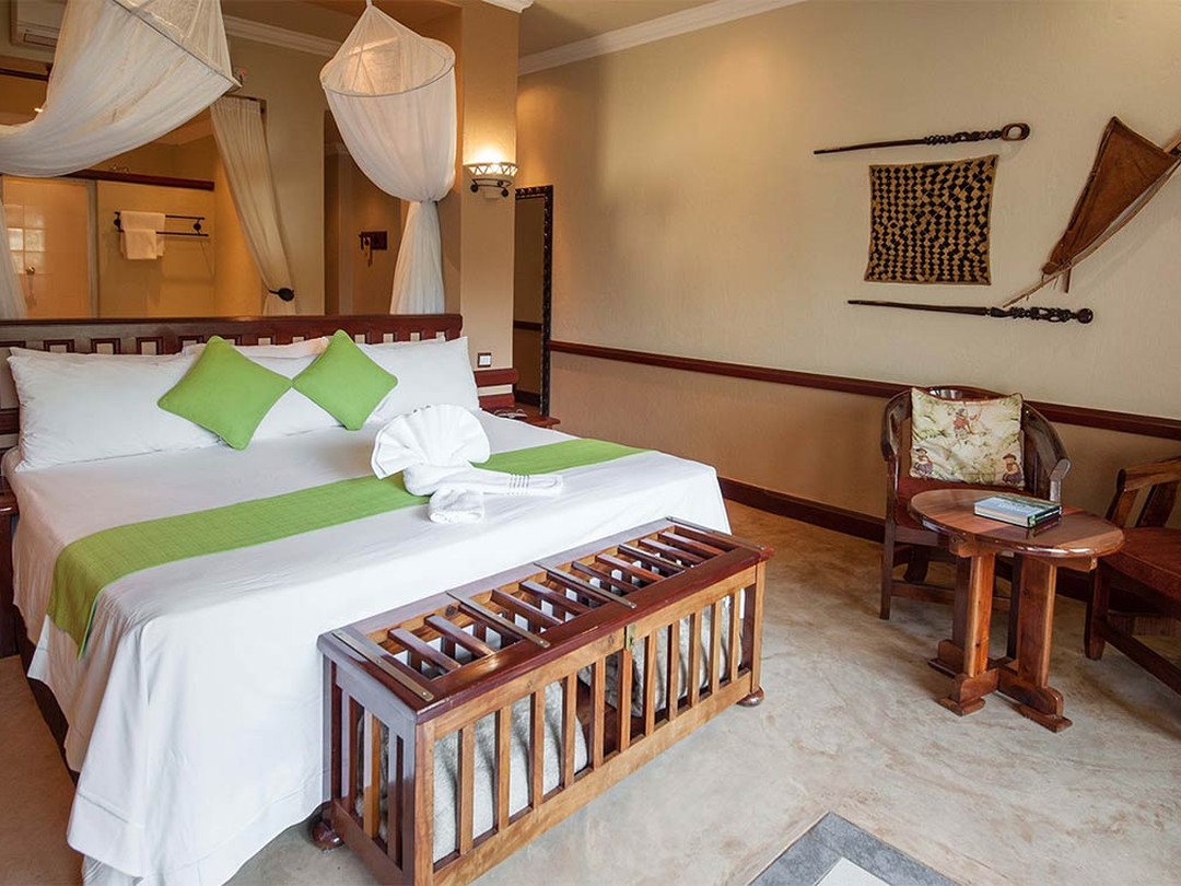 On your Victoria Falls Safari Package, luxury accommodation such as Chobe Safari Lodge in Botswana can be included to give travelers a comfortable and relaxing stay close to the wildlife experiences of Chobe National Park. The lodge provides a convenient base for game drives, Chobe River boat safaris and time to unwind between activities. Pieland Gorilla Safaris helps arrange accommodation in advance, especially during busy travel seasons when popular lodges can fill quickly. Early booking gives travelers a better chance of securing preferred room types and dates while ensuring that the safari itinerary, transfers and activities are coordinated smoothly.
