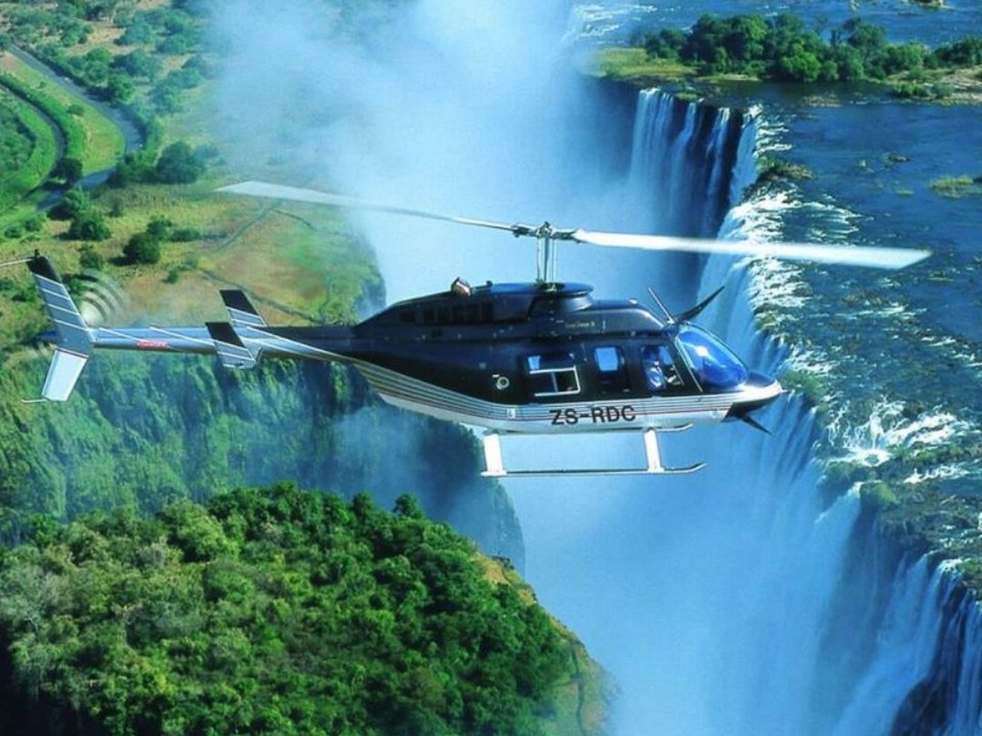 A helicopter ride over Victoria Falls is an amazing safari experience with Pieland Gorilla Safaris, offering travelers a spectacular aerial view of the mighty Zambezi River and the dramatic waterfall below. From above, visitors can appreciate the enormous scale of Victoria Falls, the rising clouds of mist, surrounding rainforest, and deep Batoka Gorge. The flight provides exceptional photography opportunities and a perspective that cannot be experienced from the ground. Whether enjoyed during high or low water, the scenic helicopter ride adds excitement and adventure to the journey, making it one of the most memorable activities on a Victoria Falls safari.
