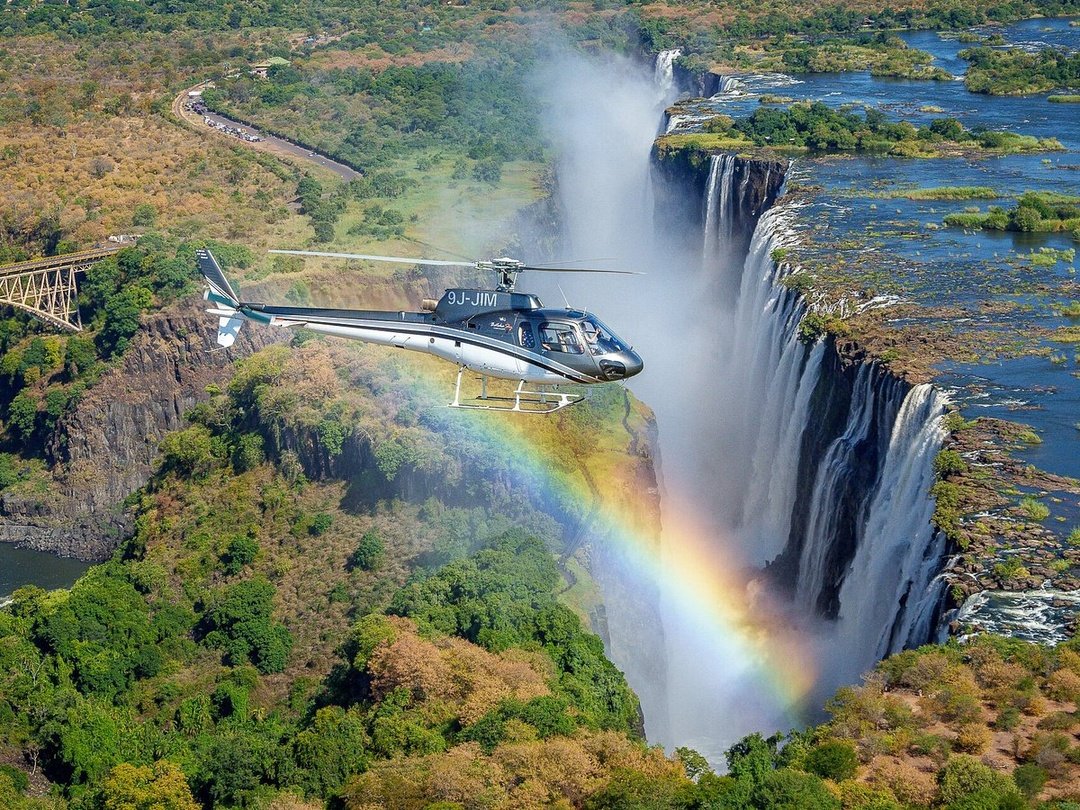 A helicopter safari over Victoria Falls is an exciting optional activity during a 5 Days Victoria Falls and Chobe Safari with Pieland Gorilla Safaris. The scenic flight gives travelers a spectacular aerial perspective of Victoria Falls, the Zambezi River, Batoka Gorge and the surrounding landscapes. From above, guests can appreciate the enormous scale of the waterfall, rising mist and dramatic gorge formations that are difficult to fully understand from the ground. The helicopter experience is especially popular with couples, honeymooners and photographers. It can be added to the itinerary subject to weather, availability and the final safari package.