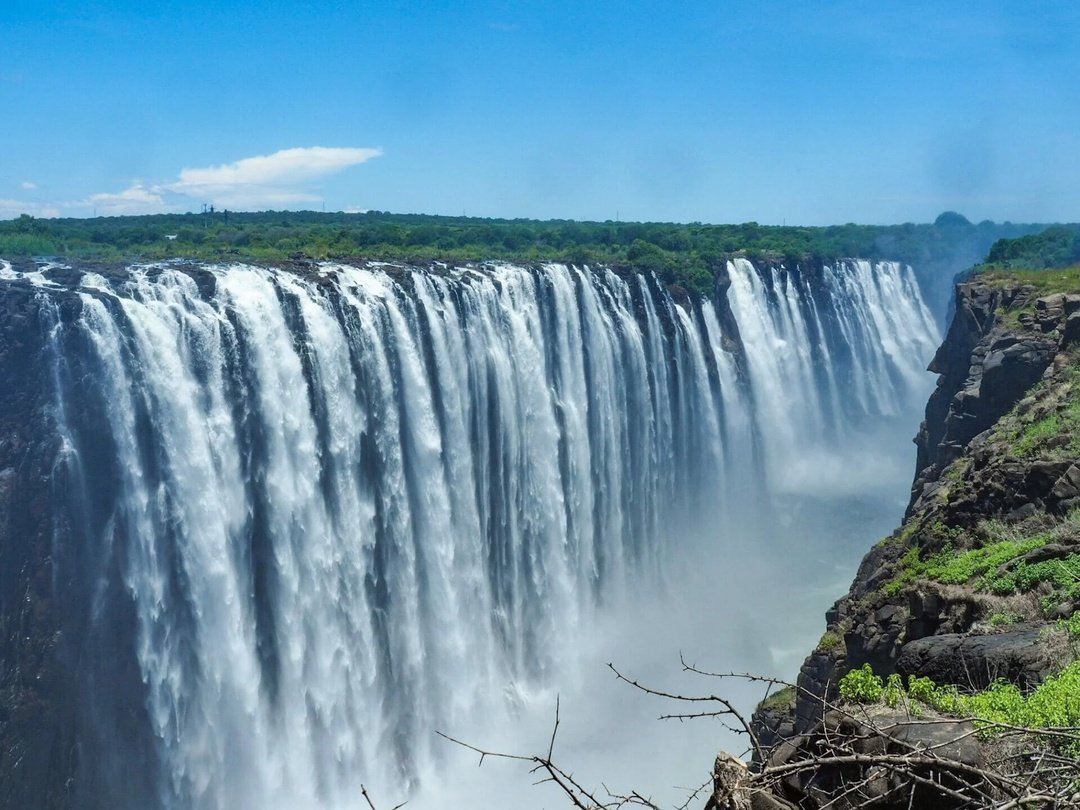 Victoria Falls is located on the mighty Zambezi River, forming a spectacular natural border between Zambia and Zimbabwe. Known as one of the world’s largest and most impressive waterfalls, it is created as the Zambezi River plunges into a deep gorge, producing a breathtaking curtain of water, powerful mist, and unforgettable views. The falls are a famous highlight of African safaris and adventure experiences.