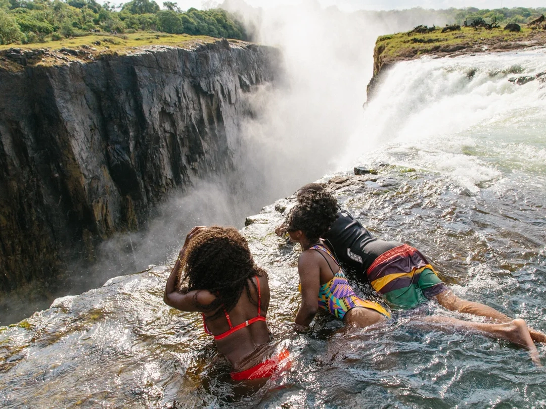 Low-season water levels can be an excellent time for a safari to Victoria Falls, especially for travelers who want to experience Devil’s Pool. As the Zambezi River drops, more of the rocky edge becomes visible and seasonal activities near the falls may open when conditions are considered safe. On a safari with Pieland Gorilla Safaris, visitors can enjoy clearer views into the gorge, dramatic rock formations, and the thrilling Devil’s Pool experience on the Zambian side. This season also offers excellent photography opportunities, combining adventure, scenery, and a very different perspective of Victoria Falls from the powerful high-water months.