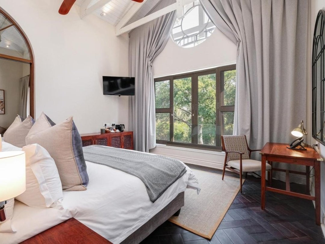 Palm River Hotel is one of the best Victoria Falls lodges for families seeking comfort, space, and a peaceful riverside setting. Located along the banks of the Zambezi River, the hotel offers elegant accommodation, landscaped gardens, a swimming pool, quality dining, and relaxing areas where families can unwind together. Its convenient location makes it easy to enjoy guided Victoria Falls tours, Zambezi River cruises, wildlife activities, and other family-friendly experiences. Palm River Hotel is especially suitable for parents traveling with children who want a comfortable, refined, and well-located base while exploring the natural attractions around Victoria Falls.