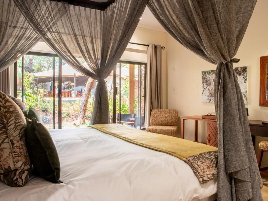 Shongwe Lookout is a stylish mid-range accommodation option in Victoria Falls, ideal for travelers looking for comfort, character, and a peaceful atmosphere. The lodge offers well-appointed rooms, attractive gardens, relaxing communal areas, and a distinctive lookout tower where guests can enjoy views across the surrounding landscape. Its location provides convenient access to Victoria Falls, Zambezi River activities, restaurants, and other local attractions. Shongwe Lookout is especially suitable for couples, families, and independent travelers who want a comfortable stay with a boutique feel while exploring Victoria Falls and continuing onward to destinations such as Chobe National Park.