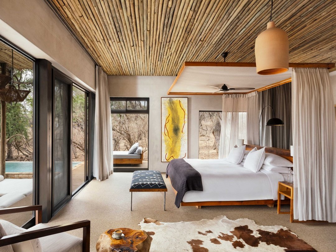 Matetsi Victoria Falls is an ultra-luxury safari lodge located along a private stretch of the Zambezi River near Victoria Falls, Zimbabwe. Surrounded by pristine wilderness, the lodge offers elegant suites, exceptional dining, and personalized service in a peaceful riverside setting. Guests enjoy exclusive wildlife experiences, river cruises, and easy access to Victoria Falls while experiencing the perfect blend of luxury, adventure, and authentic African safari hospitality.
