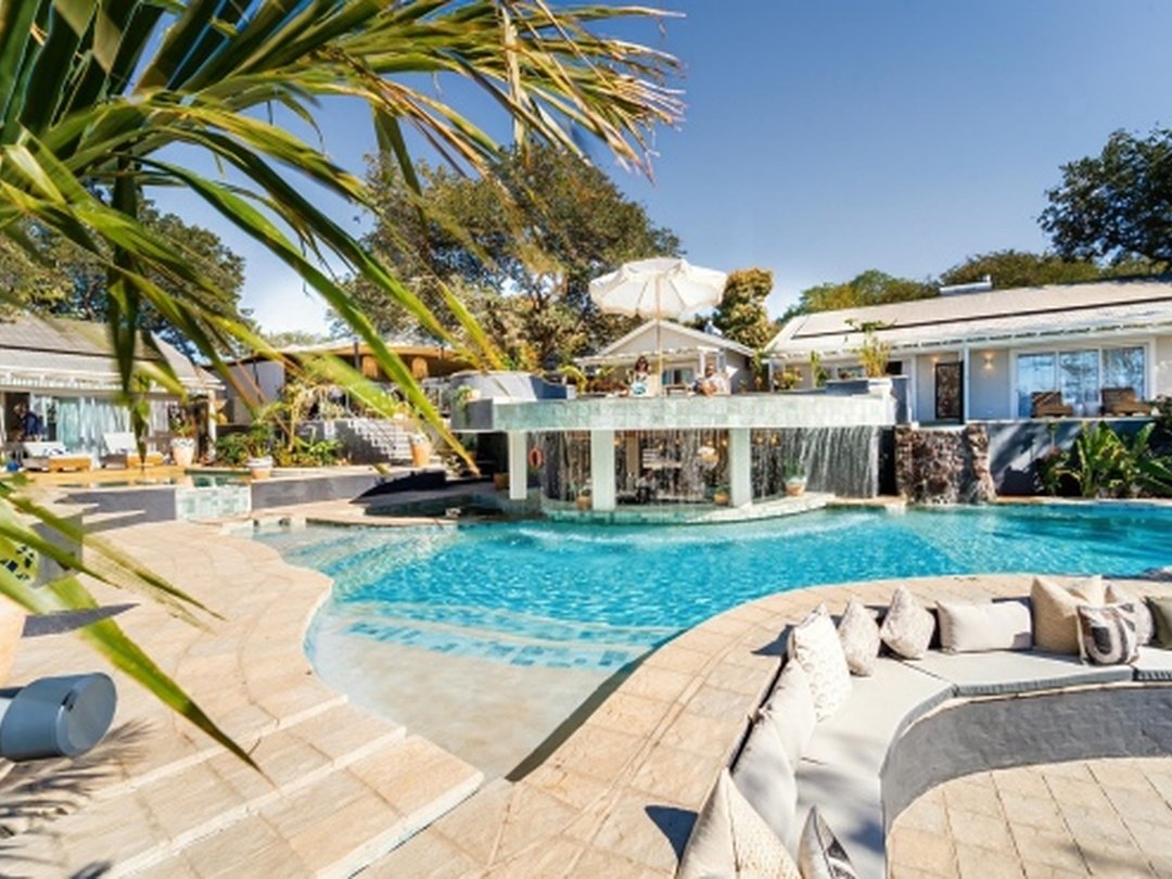 The Victoria Falls Hotel is one of the best lodges in Victoria Falls for travelers seeking classic elegance, comfort, and convenient access to the famous waterfall. Known for its historic character and refined atmosphere, the hotel offers stylish rooms, beautiful gardens, excellent dining, and impressive views across the surrounding landscape. Its location makes it easy for guests to visit Victoria Falls, enjoy Zambezi River activities, and explore nearby attractions. The hotel is especially suitable for couples, honeymooners, families, senior travelers, and luxury guests looking for a sophisticated stay combined with easy access to the highlights of Victoria Falls.