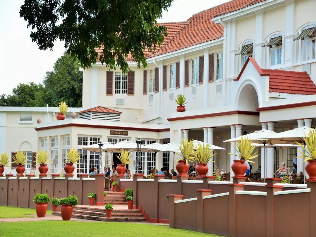 The Victoria Falls Hotel is the oldest and one of the most luxurious hotels at Victoria Falls, Zimbabwe. Built in 1904, this historic Edwardian-style hotel combines timeless elegance with modern comfort and offers spectacular views of the Victoria Falls Bridge and surrounding gorge. Known as the “Grand Old Lady of the Falls,” it features beautiful gardens, fine dining, and a rich heritage of hosting travelers from around the world.With its classic architecture, luxurious rooms, and prime location near the falls, the hotel provides guests with a unique blend of history, romance, and exceptional hospitality, making it one of the most iconic places to stay when visiting Victoria Falls.