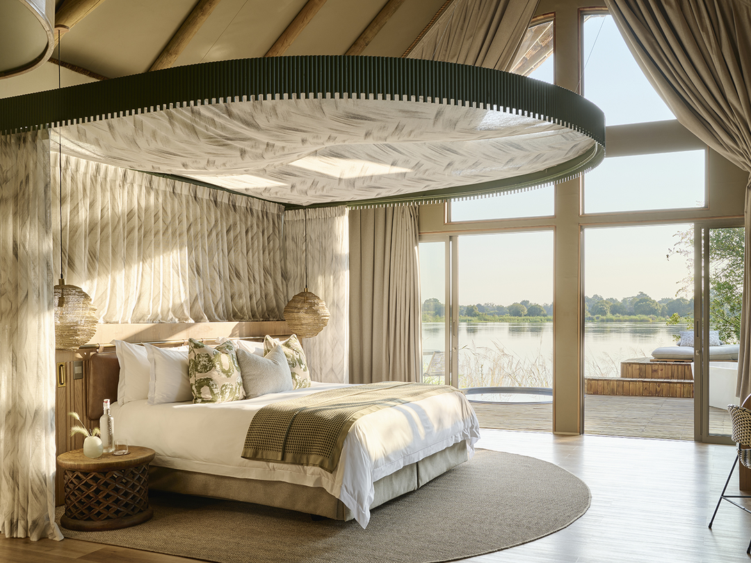 Luxury Victoria Falls River Lodge offers an elegant and peaceful place to stay near Victoria Falls during a safari organized by Pieland Gorilla Safaris. Set beside the Zambezi River, the lodge combines comfort, privacy, beautiful scenery, and easy access to some of the region’s most memorable activities. Guests can relax in spacious luxury accommodation, enjoy river views, fine dining, and quiet moments surrounded by nature. Its location also makes it convenient for Victoria Falls visits, sunset cruises, and wildlife experiences. The lodge is especially suitable for couples, honeymooners, families, and travelers seeking a refined stay during their Southern African safari.