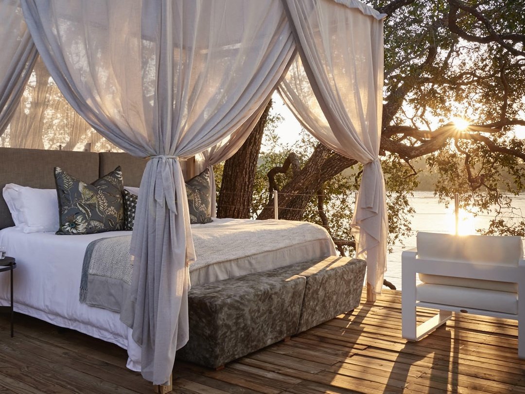 Victoria Falls River Lodge is one of the best Victoria Falls lodges for couples seeking romance, privacy, luxury, and a peaceful riverside setting. Located along the banks of the Zambezi River, the lodge offers elegant accommodation, beautiful views, refined dining, and intimate spaces ideal for relaxing together. Couples can enjoy sunset cruises, wildlife activities, private moments beside the river, and easy access to Victoria Falls attractions. It is especially suitable for honeymooners, anniversary trips, and romantic getaways, combining high-end comfort with nature and a memorable safari atmosphere in one of Southern Africa’s most spectacular destinations.