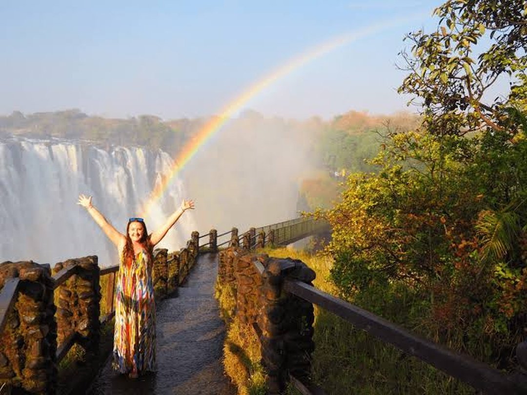 Standing at Victoria Falls during a safari to Victoria Falls with Pieland Gorilla Safaris is an unforgettable experience filled with power, beauty, and emotion. The traveler stands along the scenic rainforest pathways as the mighty Zambezi River crashes into the dramatic gorge below, sending clouds of mist into the air and creating brilliant rainbows across the falls. Surrounded by lush vegetation and the thunderous sound of rushing water, the moment feels truly extraordinary. With Pieland Gorilla Safaris, visitors can enjoy guided viewpoints, photography opportunities, and insightful interpretation, making Victoria Falls one of the most memorable highlights of a Southern African safari.