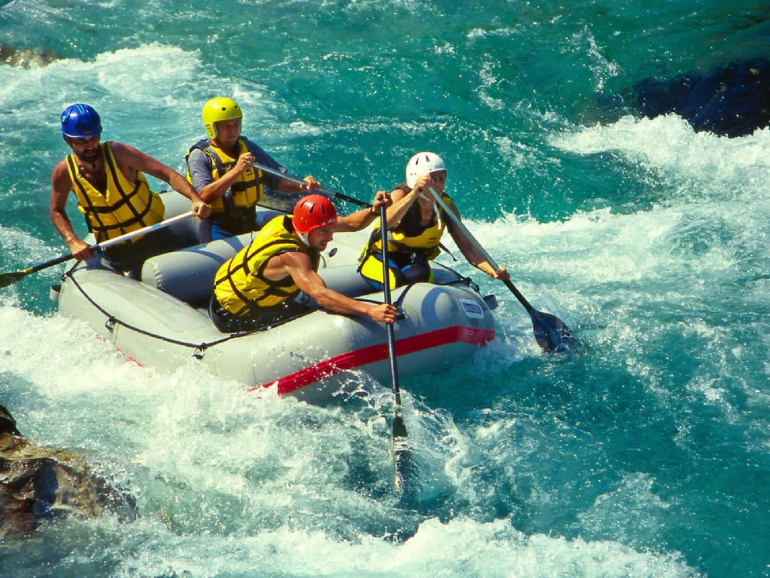 Tourists enjoying white-water rafting during a safari to Victoria Falls with Pieland Gorilla Safaris .The experience is one of the most exciting adventures on the Zambezi River. Guided by experienced rafting professionals, travelers navigate powerful rapids below the falls while surrounded by the dramatic walls of Batoka Gorge. The activity combines teamwork, adrenaline, spectacular scenery, and the thrill of moving through one of Africa’s most famous river systems. Between the rapids, visitors can appreciate the beauty of the gorge and surrounding wilderness. White-water rafting adds an adventurous dimension to a Victoria Falls safari and creates unforgettable memories for active travelers.