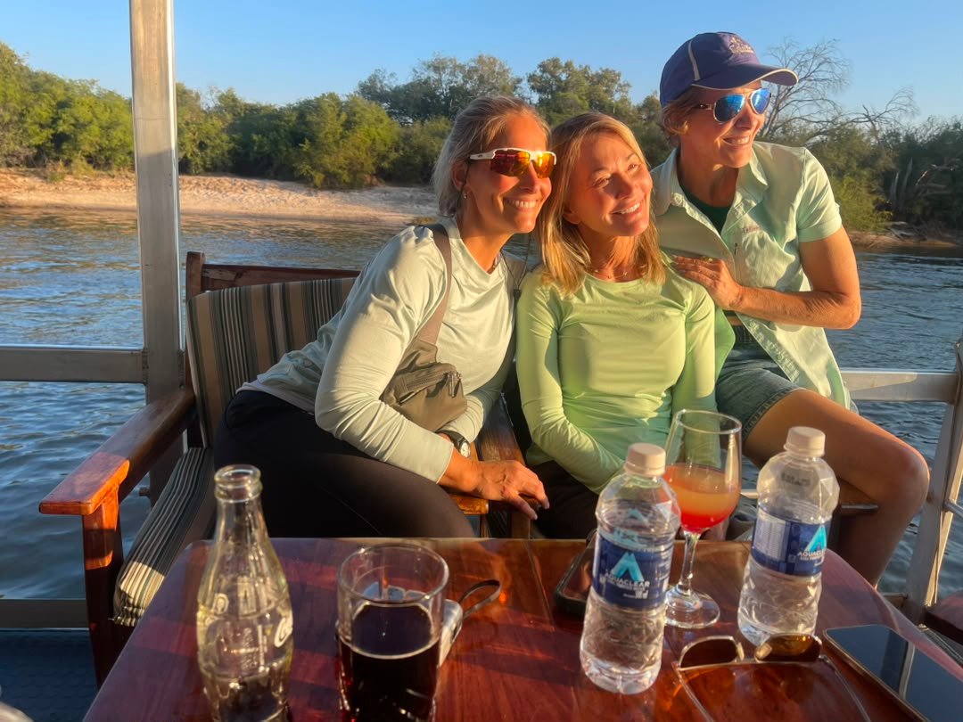 A Zambezi River sunset cruise is one of the best activities to enjoy on a safari to Victoria Falls with Pieland Gorilla Safaris. As the sun begins to set, travelers cruise gently along the upper Zambezi River while enjoying peaceful scenery, warm evening light, and excellent opportunities to spot wildlife. Hippos, crocodiles, elephants, and numerous bird species may be seen along the riverbanks. The cruise offers a relaxing contrast to the powerful atmosphere of Victoria Falls, allowing guests to unwind while watching the African sunset. It is especially memorable for couples, families, photographers, and first-time visitors to the region.