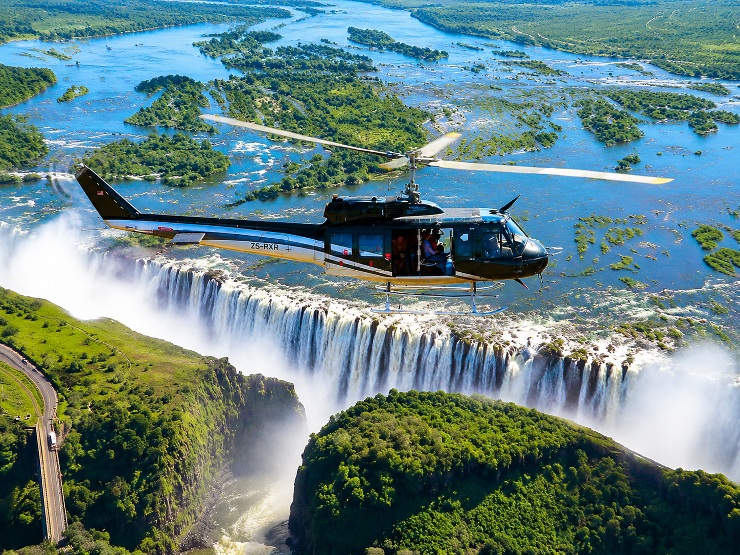 A helicopter tour over Victoria Falls offers a breathtaking aerial perspective of one of Africa’s most iconic natural wonders. From above, travellers can admire the full scale of the mighty waterfall, the Zambezi River, surrounding islands, and spectacular landscapes that cannot be fully seen from the ground. The scenic flight provides unforgettable photography opportunities and a thrilling adventure experience. It is perfect for couples, families, and safari travellers seeking a unique way to appreciate the beauty, power, and magnificence of Victoria Falls from the sky.