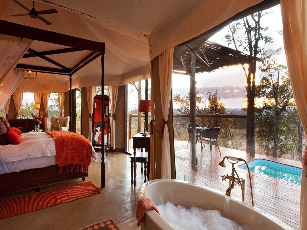 The Elephant Camp Victoria Falls, a luxury safari lodge offering elegant accommodation, beautiful views, personalized hospitality and convenient access to the spectacular Victoria Falls.