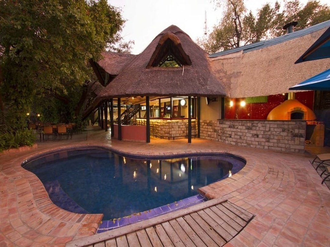 The Victoria Falls Waterfront, a relaxing accommodation and leisure destination near Victoria Falls, offering comfortable facilities, scenic surroundings and convenient access to the Zambezi River and spectacular waterfall.