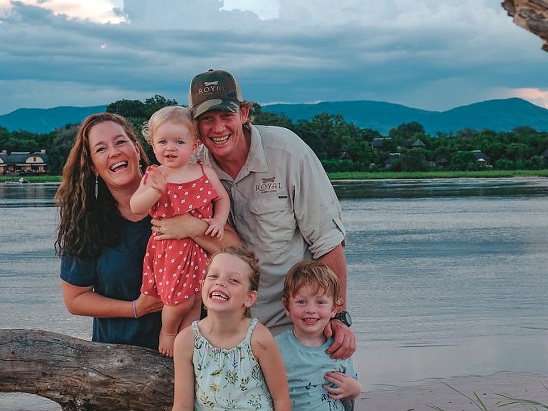 Family enjoying a safari in Zambezi National Park, Zimbabwe.