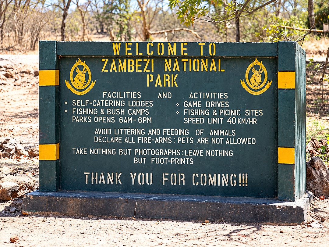 Zambezi National Park entrance gate where visitors pay park entrance fees before starting their safari.
