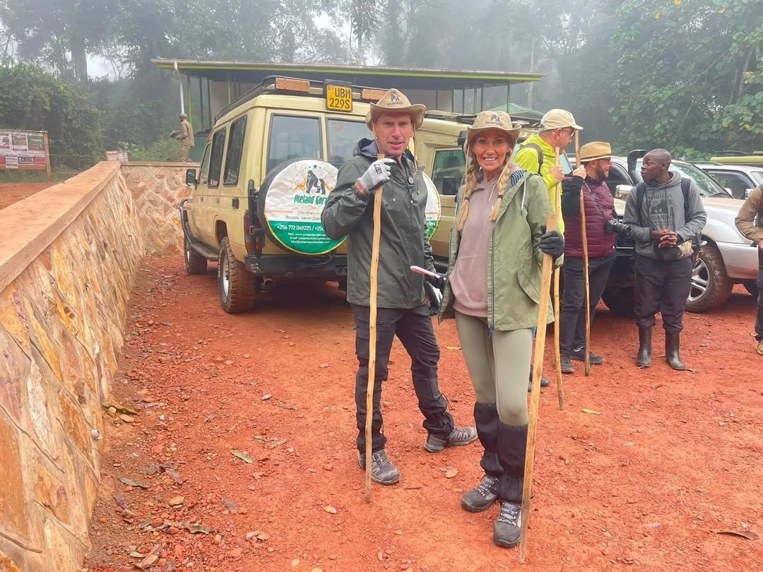 Tourists dressed in long trousers and suitable trekking clothing ready for gorilla trekking in Bwindi Impenetrable National Park, Uganda.