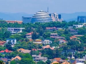 Panoramic view of Kigali city skyline featuring the Kigali Convention Centre, modern buildings and green hills in Rwanda.